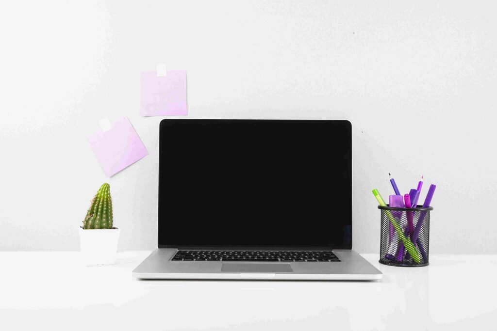 laptop-front-adhesive-notes-stucked-wall_11zon